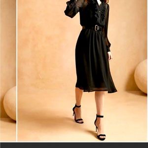 Great black midi dress good for this season . Very cute